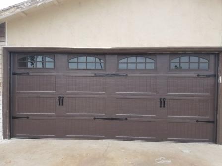 wood look garage doors with windows and hardware